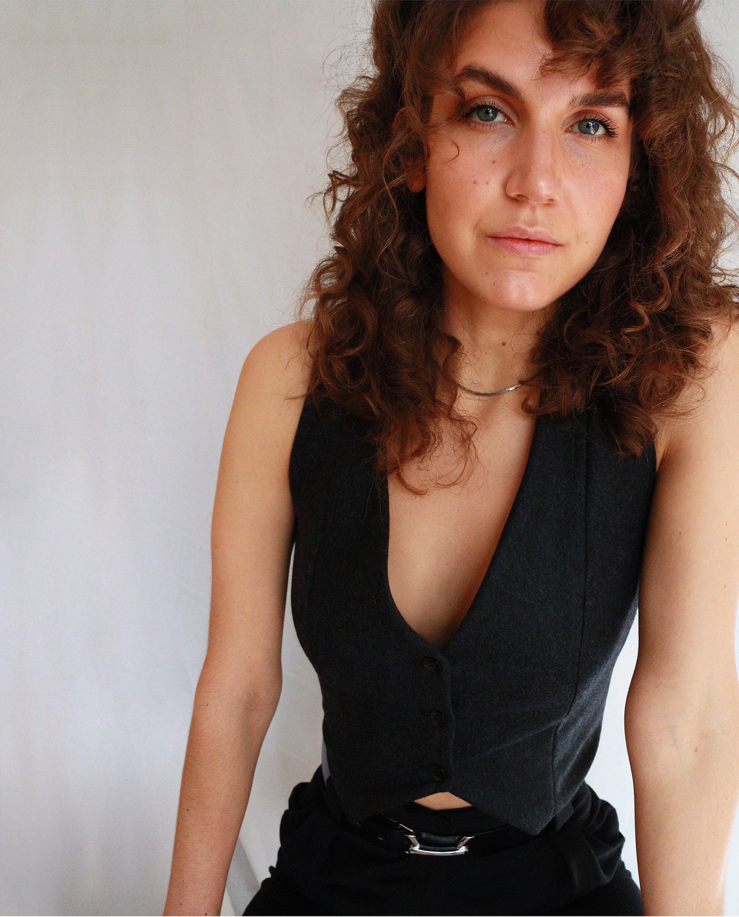 Cropped modern waistcoat sewing pattern for women's vest.